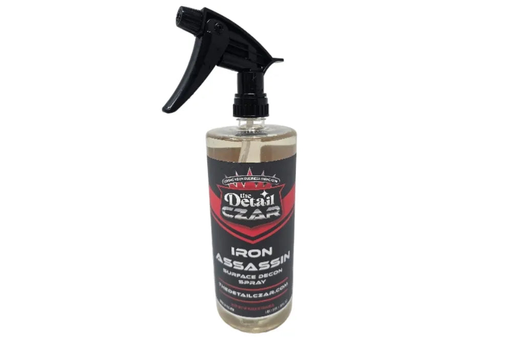 The Detail Czar Iron Assassin surface decontamination spray in a labeled spray bottle.